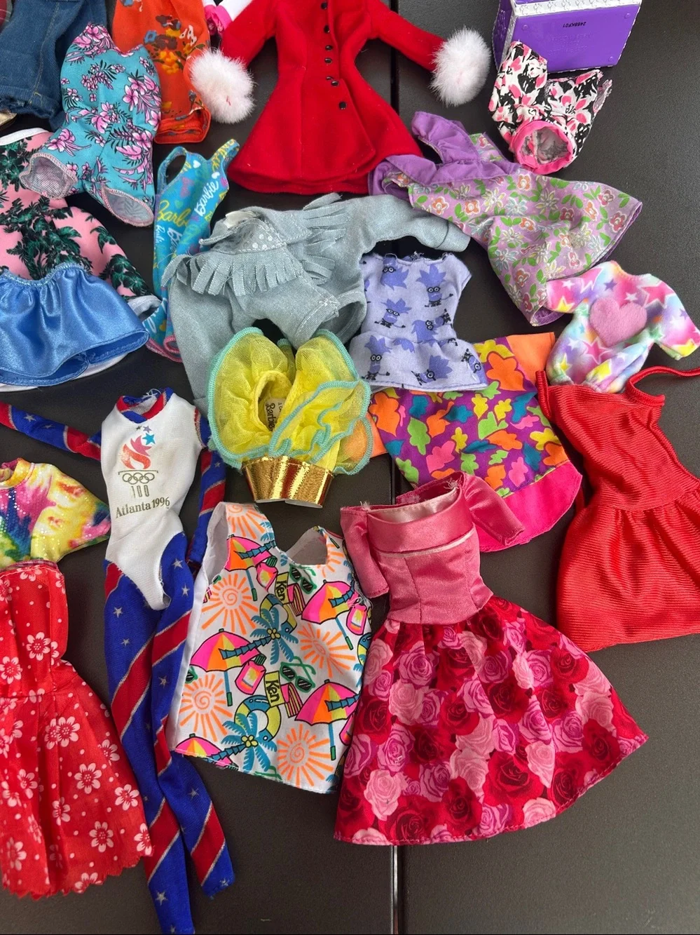 lot of Barbie and unbranded doll clothes